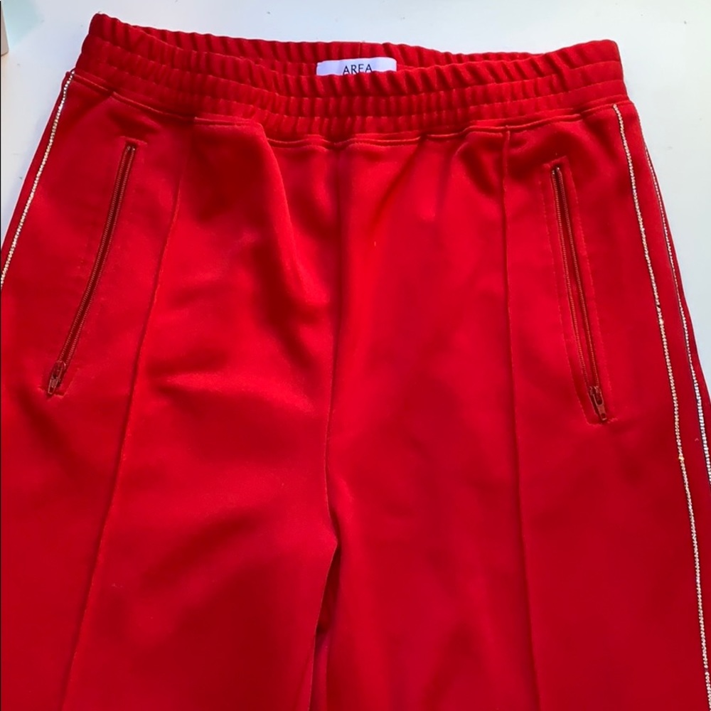 Area Bright Red crystal trimmed track pants